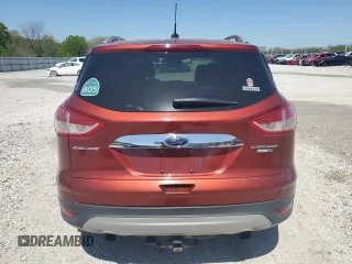 2016 Ford Escape Titanium z VIN 1FMCU9J99GUA91223, wystawiony jako Copart lot #54666545 z przebiegiem 109 684 mil mil oraz Szkoda całkowita • Salvage title. Historia ofert i sprzedaży dostępna na DreamBid. Obrazek 6.