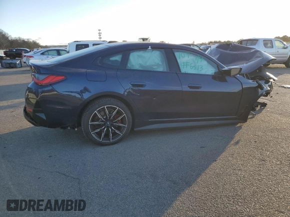 2023 BMW i4 M50 with VIN WBY33AW08PFP06513, listed as a Copart auction lot 87903685 with 0 mi miles and Salvage Title. Bid and sale history available at carsss.com. Image 3.