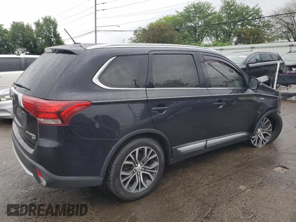 2016 Mitsubishi Outlander GT with VIN JA4JZ4AX1GZ051410, listed as a Copart auction lot 59039995 with 120,892 mi miles and Salvage title. Bid and sale history available at DreamBid. Image 3.