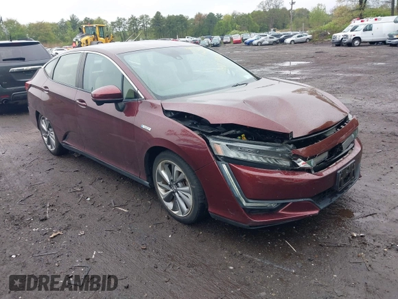 2018 Honda Clarity z VIN JHMZC5F12JC021958, wystawiony jako IAAI lot #42191071 z przebiegiem 29 423 mil mil oraz . Historia ofert i sprzedaży dostępna na DreamBid. Obrazek 1.