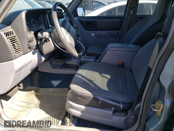1997 Jeep Cherokee SE with VIN 1J4FJ28S4VL544977, listed as a Copart auction lot 70059214 with 271,174 mi miles and Salvage Title. Bid and sale history available at carsss.com. Image 7.