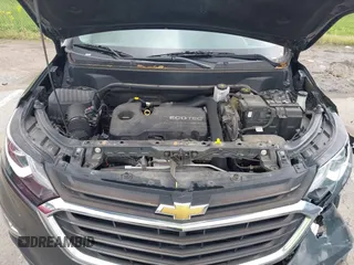 2019 Chevrolet Equinox LT z VIN 2GNAXKEV3K6125060, wystawiony jako IAAI lot #42162180 z przebiegiem 83 100 mil mil oraz . Historia ofert i sprzedaży dostępna na DreamBid. Obrazek 10.