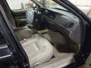 2009 Mercury Grand Marquis LS with VIN 2MEHM75V39X602084, listed as a IAAI auction lot 41615859 with 102,051 mi miles. Bid and sale history available at carsss.com. Image 5.