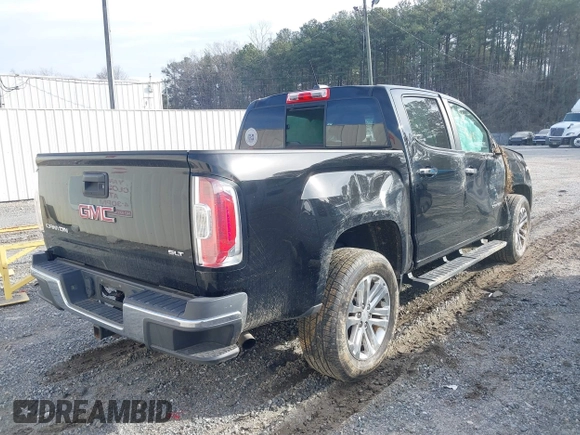 2015 GMC Canyon 2WD SLT with VIN 1GTG5CE38F1247533, listed as a IAAI auction lot 41369019 with 94,443 mi miles. Bid and sale history available at carsss.com. Image 4.