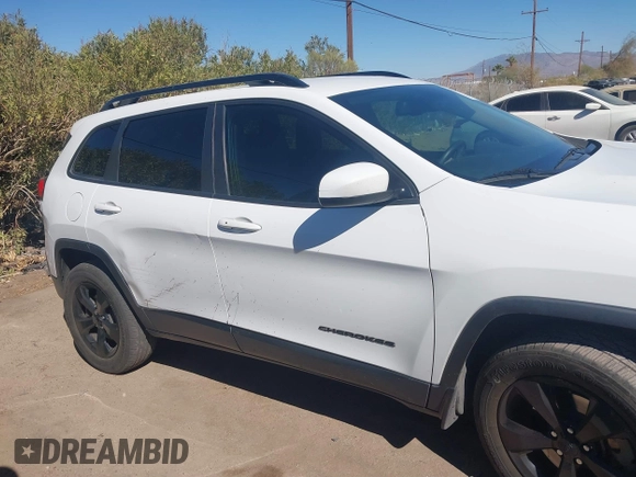 2016 Jeep Cherokee Latitude with VIN 1C4PJMCS9GW134769, listed as a IAAI auction lot 41668793 with 122,539 mi miles and . Bid and sale history available at carsss.com. Image 13.