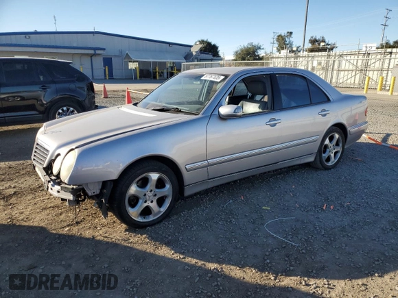 2002 Mercedes-Benz E-Class with VIN WDBJF65J82B478924, listed as a Copart auction lot 87767635 with 154,377 mi miles and Salvage Title. Bid and sale history available at carsss.com. Image 1.