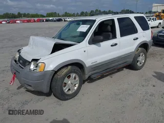 2002 Ford Escape XLT Choice with VIN 1FMYU03102KB44453, listed as a IAAI auction lot 41951739 with 331,792 mi miles and . Bid and sale history available at DreamBid. Image 2.