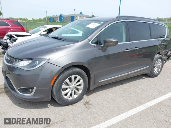 2017 Chrysler Pacifica Touring L with VIN 2C4RC1BG1HR540246, listed as a IAAI auction lot 42107768 with 151,268 mi miles and . Bid and sale history available at DreamBid. Image 17.