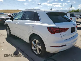 2021 Audi Q3 Premium with VIN WA1AUCF38M1067676, listed as a Copart auction lot 71621704 with 77,395 mi miles and Salvage Title. Bid and sale history available at carsss.com. Image 2.