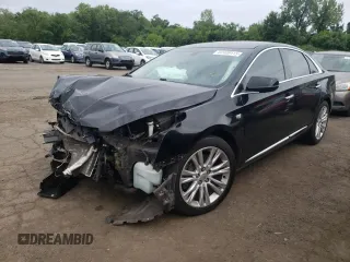 2018 Cadillac XTS Luxury with VIN 2G61M5S33J9144844, listed as a Copart auction lot 62409115 with Not provided miles and Salvage title. Bid and sale history available at DreamBid. Image 1.