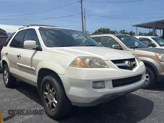 2004 Acura MDX Touring z VIN 2HNYD18954H530413, wystawiony jako Copart lot #57705325 z przebiegiem 207 938 mil mil oraz Czysty tytuł • Clean title. Historia ofert i sprzedaży dostępna na DreamBid. Obrazek 1.