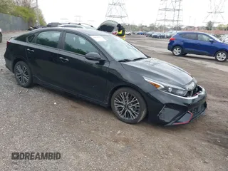 2023 Kia Forte GT-Line z VIN 3KPF54ADXPE627228, wystawiony jako IAAI lot #42022939 z przebiegiem 50 574 mil mil oraz . Historia ofert i sprzedaży dostępna na DreamBid. Obrazek 1.