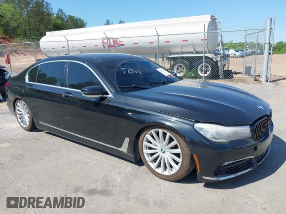 2016 BMW 7 Series 740i with VIN WBA7E2C55GG547752, listed as a IAAI auction lot 41992704 with Not Provided miles and . Bid and sale history available at carsss.com. Image 1.