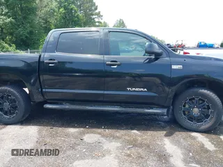 2013 Toyota Tundra with VIN 5TFDW5F12DX305493, listed as a IAAI auction lot 42265066 with 192,462 mi miles and . Bid and sale history available at DreamBid. Image 13.
