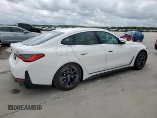 2024 BMW i4 eDrive35 with VIN WBY43AW08RFS83004, listed as a Copart auction lot 50818335 with 12,000 mi miles and Salvage Title. Bid and sale history available at carsss.com. Image 3.