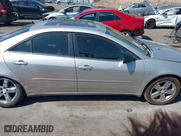 2005 Pontiac G6 GT z VIN 1G2ZH528754171686, wystawiony jako IAAI lot #42241991 z przebiegiem 168 361 mil mil oraz . Historia ofert i sprzedaży dostępna na DreamBid. Obrazek 13.