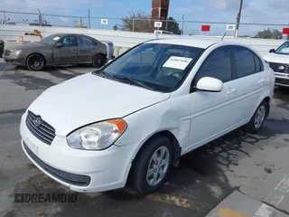 2011 Hyundai Accent GLS with VIN KMHCN4ACXBU619503, listed as a IAAI auction lot 42047496 with 131,135 mi miles. Bid and sale history available at carsss.com. Image 2.