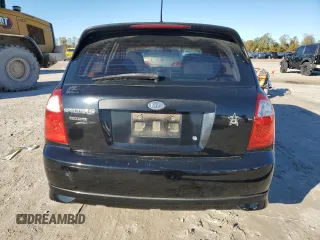 2005 Kia Spectra with VIN KNAFE161355073968, listed as a Copart auction lot 84543784 with 166,858 mi miles and Salvage Title. Bid and sale history available at carsss.com. Image 6.