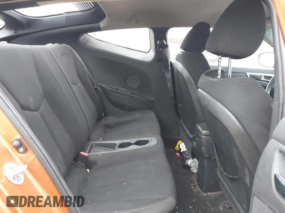 2012 Hyundai Veloster w/Gray Int with VIN KMHTC6AD3CU057620, listed as a IAAI auction lot 42320549 with 113,491 mi miles and . Bid and sale history available at DreamBid. Image 8.