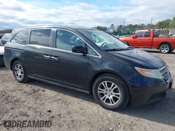 2011 Honda Odyssey EX with VIN 5FNRL5H4XBB011918, listed as a IAAI auction lot 42056043 with 201,821 mi miles and . Bid and sale history available at carsss.com. Image 1.