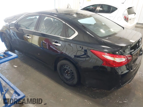 2018 Nissan Altima 2.5 SR with VIN 1N4AL3AP5JC185905, listed as a IAAI auction lot 41899469 with 56,927 mi miles. Bid and sale history available at carsss.com. Image 3.