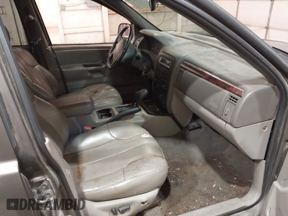 2000 Jeep Grand Cherokee Laredo z VIN 1J4GW48S1YC277710, wystawiony jako IAAI lot #42033564 z przebiegiem Nie podano mil oraz . Historia ofert i sprzedaży dostępna na DreamBid. Obrazek 5.