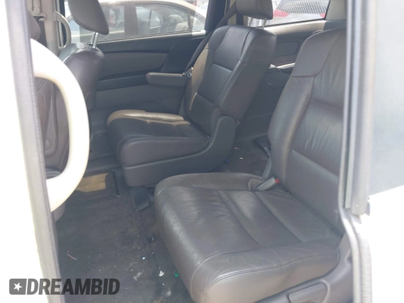 2012 Honda Odyssey EX-L with VIN 5FNRL5H63CB063684, listed as a IAAI auction lot 42576742 with 170,656 mi miles and . Bid and sale history available at DreamBid. Image 8.