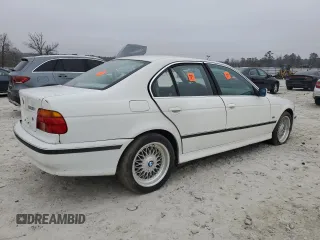 1997 BMW 5 Series 528i with VIN WBADD5321VBV51708, listed as a Copart auction lot 86942384 with 0 mi miles and Salvage Title. Bid and sale history available at carsss.com. Image 3.