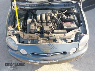 1999 Ford Taurus SE Comfort z VIN 1FAFP53S3XG104165, wystawiony jako IAAI lot #42234147 z przebiegiem 183 124 mil mil oraz . Historia ofert i sprzedaży dostępna na DreamBid. Obrazek 10.