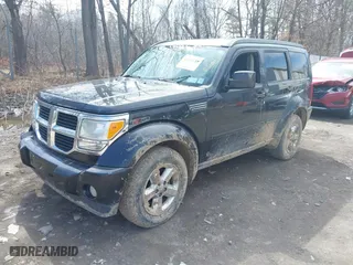 2008 Dodge Nitro SXT with VIN 1D8GU28K98W225158, listed as a IAAI auction lot 41911789 with 180,450 mi miles. Bid and sale history available at carsss.com. Image 2.
