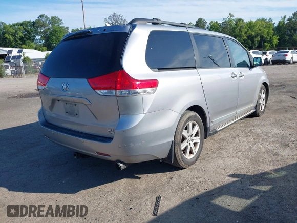 2012 Toyota Sienna XLE with VIN 5TDDK3DC6CS044409, listed as a IAAI auction lot 42409389 with 231,567 mi miles and . Bid and sale history available at DreamBid. Image 4.