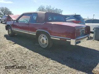 1991 Cadillac DeVille z VIN 1G6CD13B7M4306411, wystawiony jako Copart lot #50128155 z przebiegiem Nie podano mil oraz Szkoda całkowita • Salvage title. Historia ofert i sprzedaży dostępna na DreamBid. Obrazek 2.