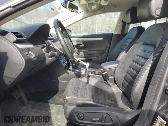 2015 Volkswagen CC Sport with VIN WVWBN7AN4FE814712, listed as a Copart auction lot 48027705 with 102,477 mi miles and Salvage Title. Bid and sale history available at DreamBid. Image 7.