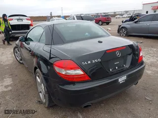 2006 Mercedes-Benz SLK-Class 3.5L with VIN WDBWK56FX6F084328, listed as a IAAI auction lot 41570145 with 104,929 mi miles. Bid and sale history available at carsss.com. Image 3.