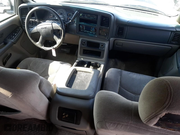 2003 GMC Yukon SLT with VIN 1GKEC13V43J171962, listed as a Copart auction lot 63244534 with 200,159 mi miles and Salvage Title. Bid and sale history available at carsss.com. Image 8.