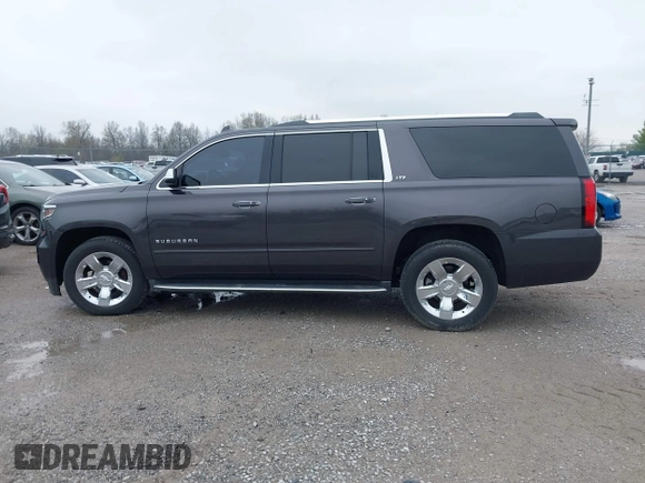 2015 Chevrolet Suburban LTZ with VIN 1GNSKKKC4FR712965, listed as a IAAI auction lot 41928053 with 188,571 mi miles. Bid and sale history available at carsss.com. Image 14.
