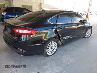 2015 Ford Fusion SE Hybrid with VIN 3FA6P0LU5FR102185, listed as a IAAI auction lot 42453553 with 172,230 mi miles and . Bid and sale history available at DreamBid. Image 4.