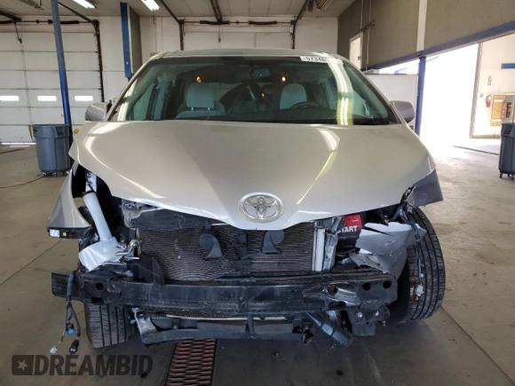 2015 Toyota Sienna LE AAS с VIN 5TDKK3DC1FS571821, выставлен на аукционе Copart как лот 57348545 с пробегом 120 014 миль миль и Списание • Salvage title. История ставок и продаж доступна на DreamBid. Изображение 5.