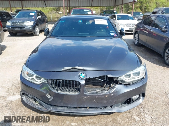 2015 BMW 4 Series 428i xDrive z VIN WBA3N5C55FK484938, wystawiony jako IAAI lot #41889907 z przebiegiem 100 439 mil mil oraz . Historia ofert i sprzedaży dostępna na DreamBid. Obrazek 12.