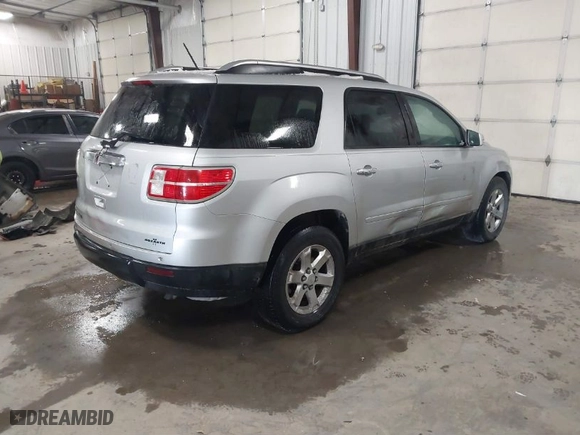 2009 Saturn Outlook XE with VIN 5GZER13D19J147949, listed as a IAAI auction lot 41529550 with 211,309 mi miles. Bid and sale history available at carsss.com. Image 4.