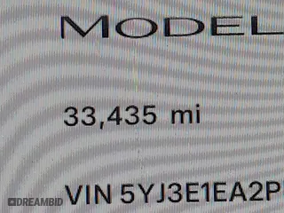 2023 Tesla Model 3 with VIN 5YJ3E1EA2PF476140, listed as a IAAI auction lot 41789189 with 33,435 mi miles. Bid and sale history available at carsss.com. Image 15.