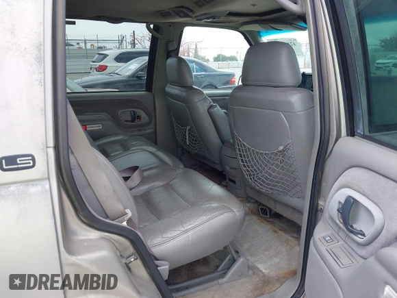 1999 Chevrolet Tahoe Z71 with VIN 1GNEK13R4XJ504675, listed as a IAAI auction lot 42162102 with 320,128 mi miles and . Bid and sale history available at DreamBid. Image 8.