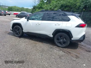 2021 Toyota RAV4 Hybrid XSE with VIN 4T3E6RFV9MU052563, listed as a IAAI auction lot 42295510 with 24,771 mi miles and . Bid and sale history available at DreamBid. Image 3.