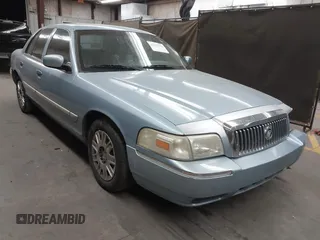 2007 Mercury Grand Marquis GS z VIN 2MEFM74W17X616113, wystawiony jako IAAI lot #42065311 z przebiegiem Nie podano mil oraz . Historia ofert i sprzedaży dostępna na DreamBid. Obrazek 1.