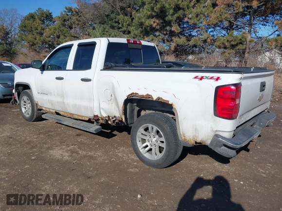 2014 Chevrolet Silverado 1500 LT with VIN 1GCVKREC6EZ147434, listed as a IAAI auction lot 41289678 with 167,445 mi miles and . Bid and sale history available at DreamBid. Image 3.