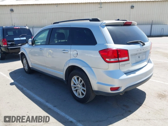 2014 Dodge Journey SXT z VIN 3C4PDDBG8ET212188, wystawiony jako IAAI lot #42101266 z przebiegiem 101 553 mil mil oraz . Historia ofert i sprzedaży dostępna na DreamBid. Obrazek 3.