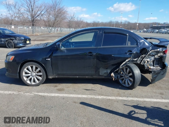 2008 Mitsubishi Lancer GTS z VIN JA3AU86U68U029426, wystawiony jako IAAI lot #41747832 z przebiegiem 183 830 mil mil oraz . Historia ofert i sprzedaży dostępna na DreamBid. Obrazek 14.
