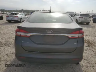 2017 Ford Fusion SE z VIN 3FA6P0H73HR294017, wystawiony jako Copart lot #50665935 z przebiegiem 62 426 mil mil oraz Czysty tytuł • Clean title. Historia ofert i sprzedaży dostępna na DreamBid. Obrazek 6.