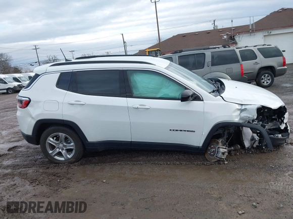 2023 Jeep Compass Latitude with VIN 3C4NJDBN6PT556992, listed as a IAAI auction lot 41226965 with 22,300 mi miles and . Bid and sale history available at DreamBid. Image 13.
