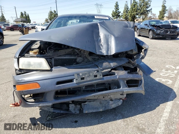 1999 Nissan Maxima GXE z VIN JN1CA21D9XM409448, wystawiony jako Copart lot #51822895 z przebiegiem Nie podano mil oraz Szkoda całkowita • Salvage title. Historia ofert i sprzedaży dostępna na DreamBid. Obrazek 5.